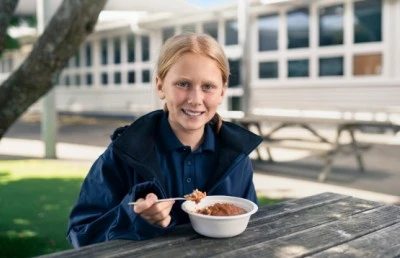 KidsCan child eating breakfast