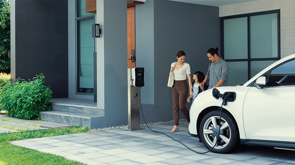 Family next to an ev