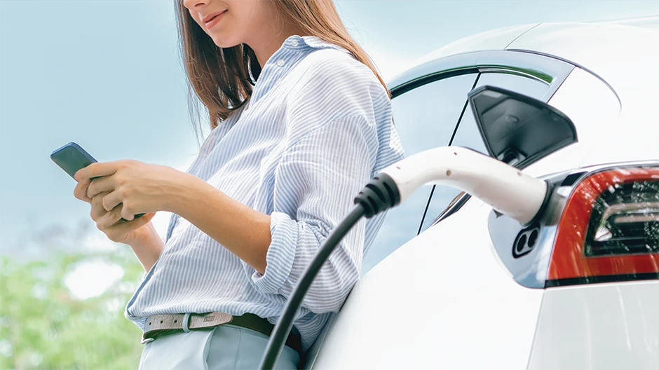Woman charging an ev