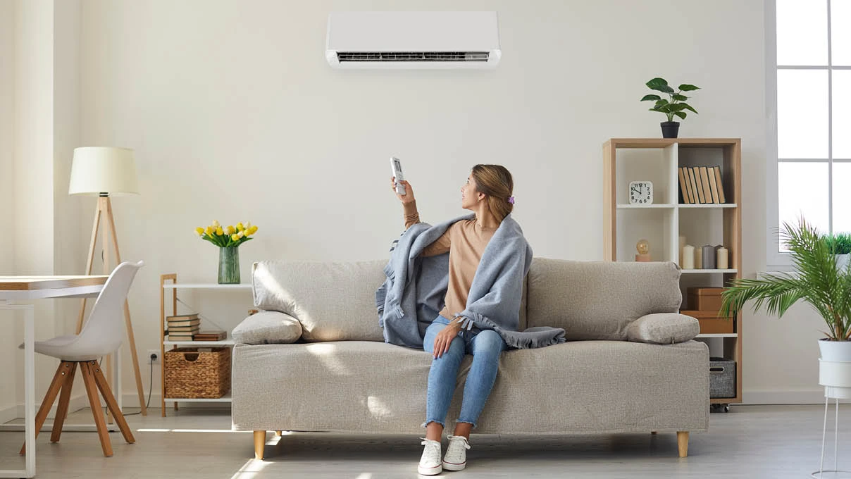 Woman using a heat pump